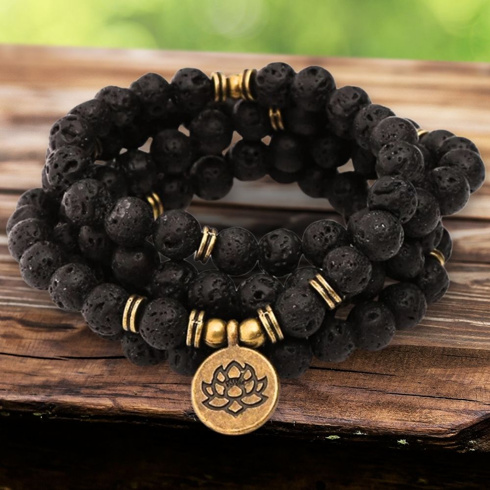 lava stone bracelet with lotus flower charm